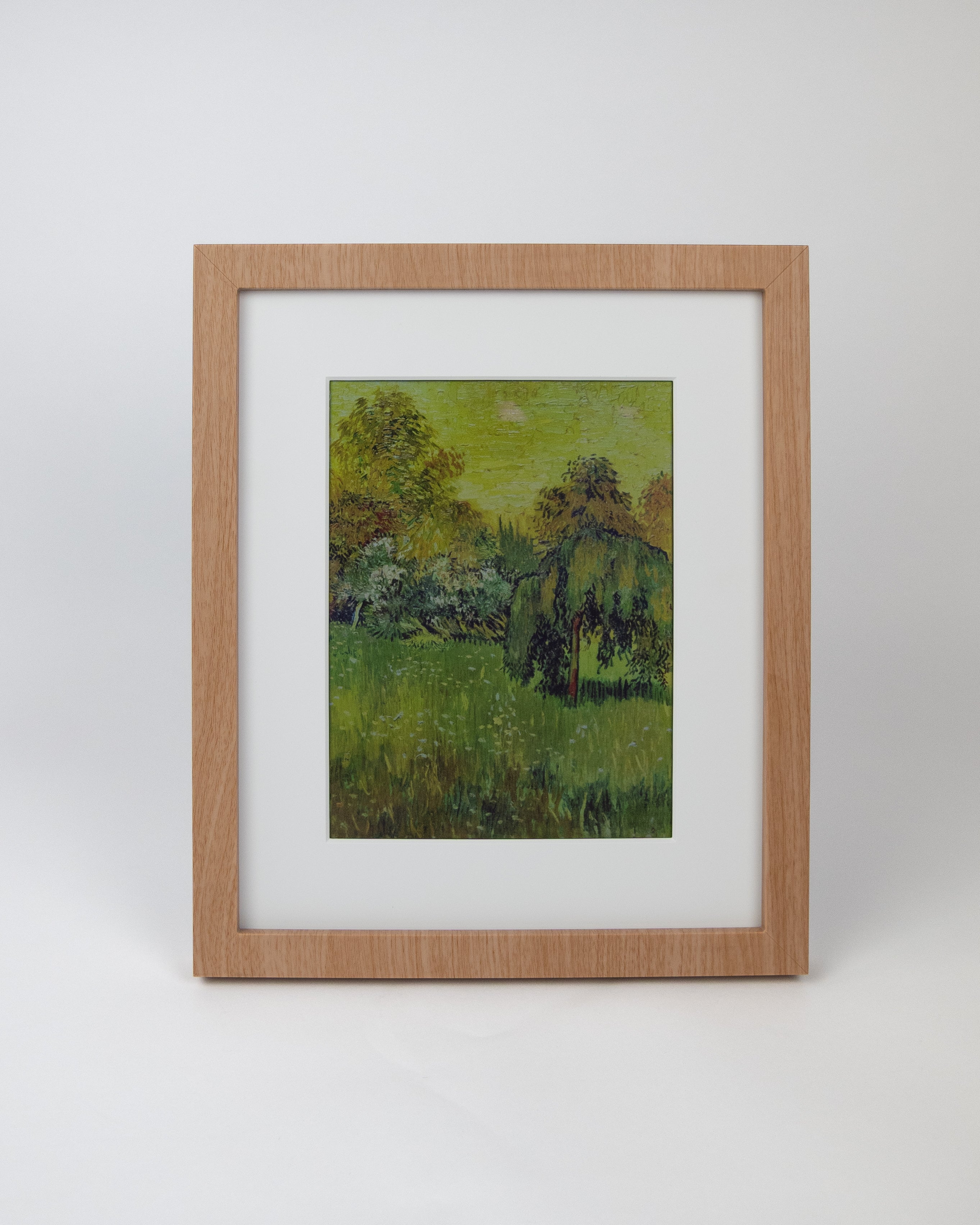 Framed artwork of a landscape with trees and grass on a white background #wood